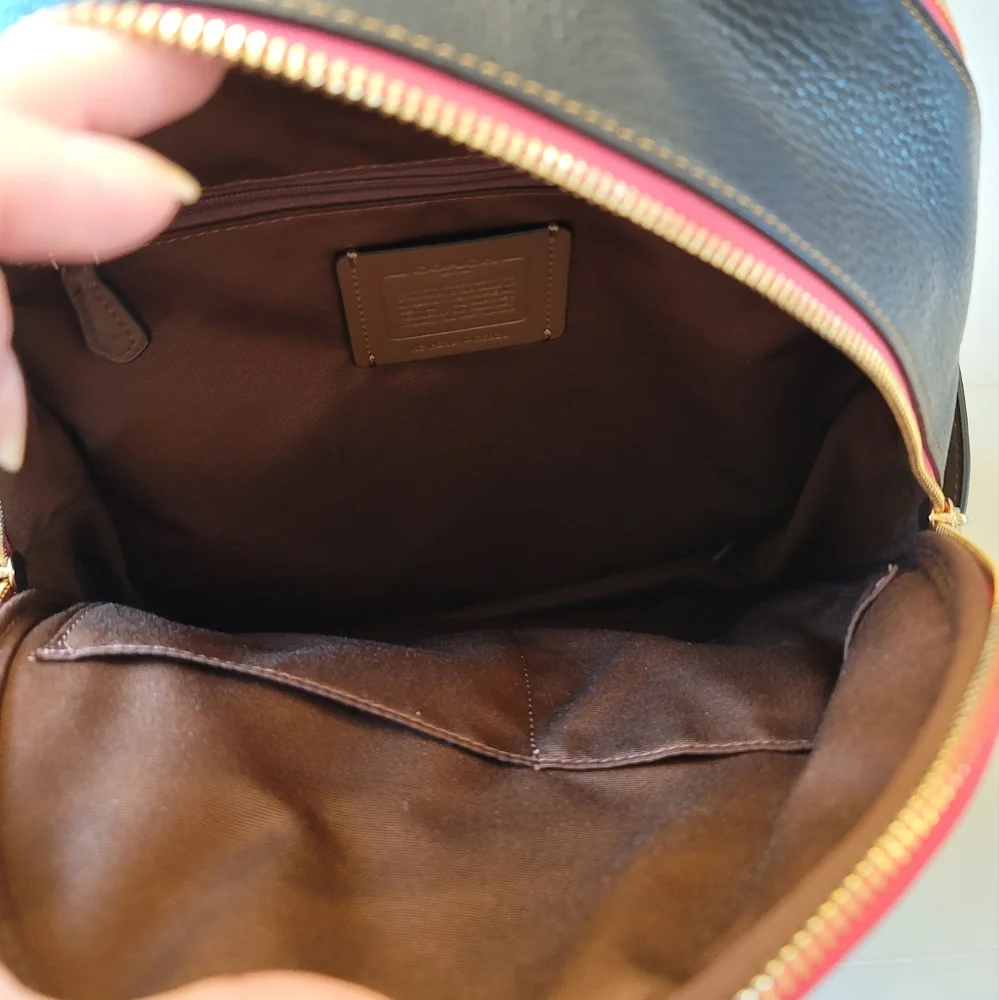 Coach Signature Brown Tan Backpack with Pink Trim and Purple Accent